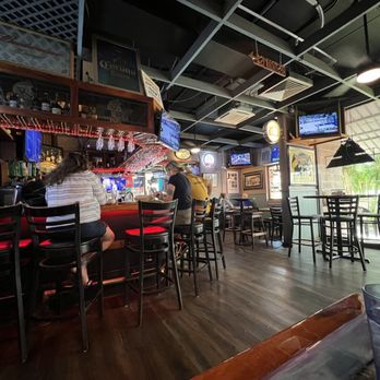 Dollies Pub & Cafe - Photo of inside the pub - Pizza Near Me - Lahaina, Hawaii Dollies Pub & Cafe - Photo of inside the pub - Pizza Near Me - Lahaina, Hawaii