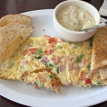 Vera's Kitchen - Spanish Omelette, Grits and Buttered Rye Bread . Simple and delicious! - Mexican Near Me - Monroe, North Carolina