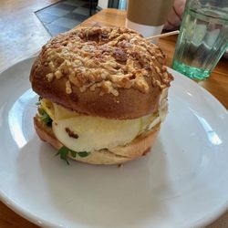 Wee Bird Bagel Cafe - Cheesy bagel with eggs, VT cheddar, apples, mustard, spinach - yum!