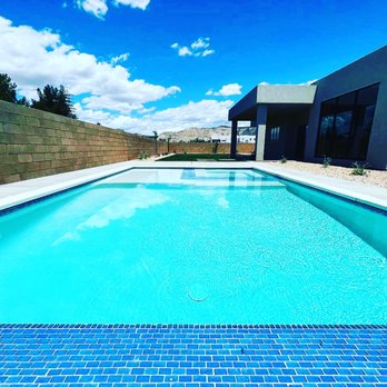 New Wave Construction - a pool in the backyard - General Contractors Near Me - Saint George, Utah New Wave Construction - a pool in the backyard - General Contractors Near Me - Saint George, Utah