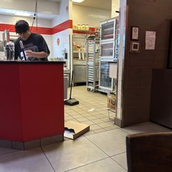Jimmy John's - Garbage on the floor. They walked over it many times when we were there.