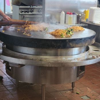 Sun's Mongolian BBQ - Three orders being cooked at once. - Chinese Near Me - Covina, California Sun's Mongolian BBQ - Three orders being cooked at once. - Chinese Near Me - Covina, California