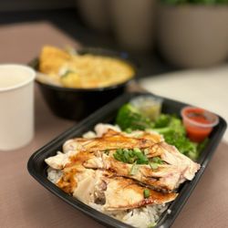 Dabao Singapore - Hainan Chicken Rice: Poached lemongrass-ginger chicken w/ side soup, broccoli, sauces: ginger-scallion, umami, calamansi chili ($16.95)