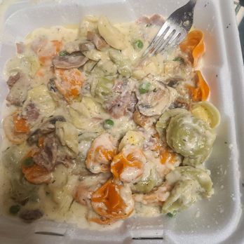 Reale's Italian Cafe - Tortellini a la Carbonara. Have to order every time.  Our favorite! - Pizza Near Me - Austin, Texas