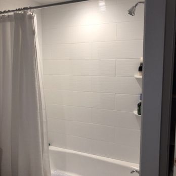 SH-Cabinetry - a bathroom with a toilet and a bathtub - Kitchen & Bath Near Me - Plymouth, Massachusetts
