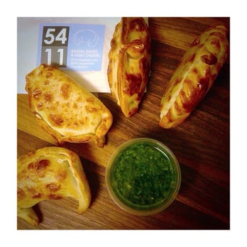 5411 Empanadas - Super cute packaging! Malbec beef, caramelized onion, sweet corn, and bacon, date & goat cheese. Can't wait to try the rest! - Empanadas Near Me - Chicago, Illinois