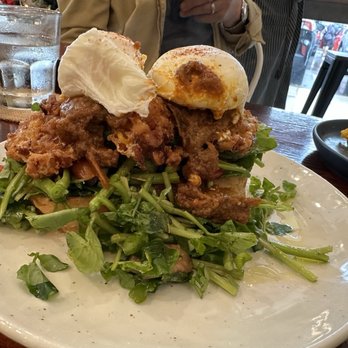 Fig & Ginger - Crispy Corn Fritters with poached eggs, sun dried tomatoes, mushroom, eggplant chutney, watercress and parsley - Breakfast & Brunch Near Me - Honolulu, Hawaii