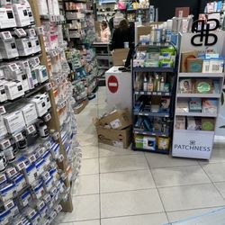 Pharmacie Anglaise - Very rude female employee with NO name tag  who refused me my PREPAID urgent medicine