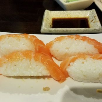 Royal Sushi - Salmon nigiri. Ridiculous chunks of rice with a thin sliver of salmon - Japanese Near Me - Chicago, Illinois Royal Sushi - Salmon nigiri. Ridiculous chunks of rice with a thin sliver of salmon - Japanese Near Me - Chicago, Illinois