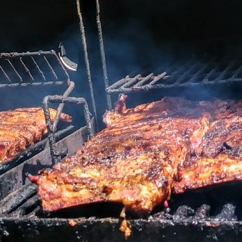 Off The Walls BBQ - ribs cooking on the grill - Barbeque Near Me - Canton, Ohio Off The Walls BBQ - ribs cooking on the grill - Barbeque Near Me - Canton, Ohio