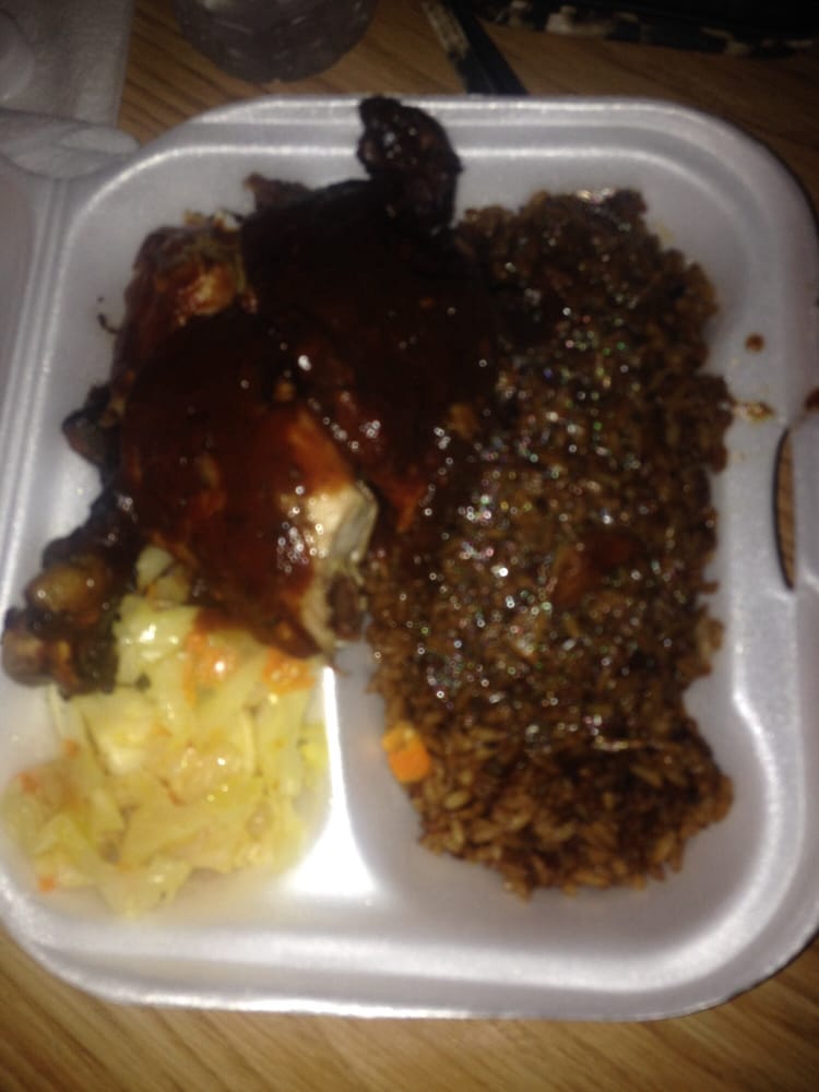 Angel Restaurant Jerk Center Logo
