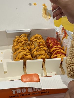 Two Hands Corn Dogs by null