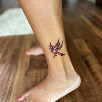 Main Street Tattoo - In honor of my grandma who loved cardinals. It was originally applied facing back but Leo suggested it should look forward. - Tattoo Near Me - League City, Texas Main Street Tattoo - In honor of my grandma who loved cardinals. It was originally applied facing back but Leo suggested it should look forward. - Tattoo Near Me - League City, Texas