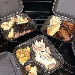 Smokey Legend Gourmet BBQ - Ribs, brisket and chicken with mac n chee, slaw, cheecorn and baked beans plus cornbread... ain't nuttin wrong with that.
