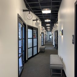 ColoRoyale - Hallway area with numbered individual salons