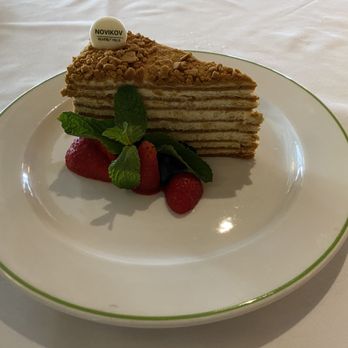 Novikov - Not only a many-layered Honey Cake as light as a cream feather, but topped with a tiny gem of fondant. How cool is that? - Mediterranean Near Me - Beverly Hills, California Novikov - Not only a many-layered Honey Cake as light as a cream feather, but topped with a tiny gem of fondant. How cool is that? - Mediterranean Near Me - Beverly Hills, California