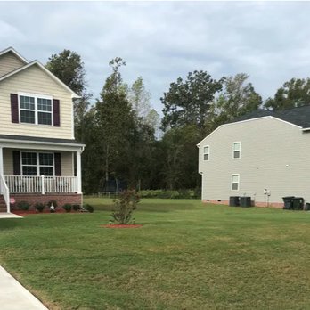 Southern State Landscape - two homes in a residential neighborhood - Lawn Services Near Me - Willow Spring, North Carolina