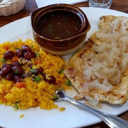 Grilled chicken breast with onions and rice & beans Grilled chicken breast with onions and rice & beans