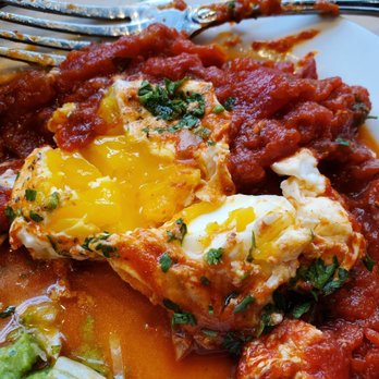 Oren's Hummus - About half a portion of Shakshuka ($14.00), with a reveal of a yolk which was overcooked slightly - Mediterranean Near Me - Cupertino, California
