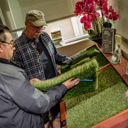 The Synthetic Grass Store - Contractors compare samples of premium artificial grass for an upcoming landscape design project -- at The Synthetic Grass Store