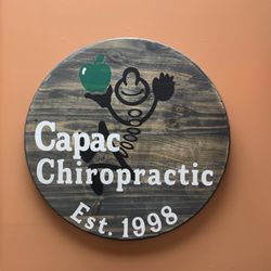 Capac Chiropractic - Plaque at front desk
