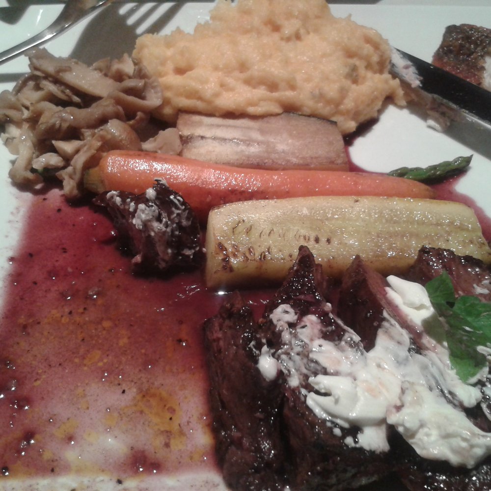 NoJa - 8 ounce Hanger steak with goat cheese and red wine reduction. - New American Near Me - Mobile, Alabama NoJa - 8 ounce Hanger steak with goat cheese and red wine reduction. - New American Near Me - Mobile, Alabama