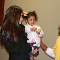 True Vitality KC - Dr. Giles educating his sister in law and niece on the importance of chiropractic for all ages.