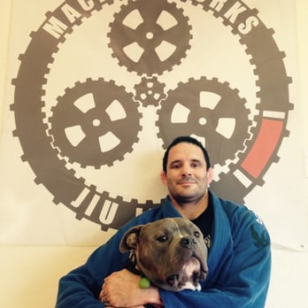 Machine Works Jiu Jitsu - Black belt and owner Jeremy Adkins and team mascot Meatball the pitbull - Martial Arts Near Me - Oakland, California Machine Works Jiu Jitsu - Black belt and owner Jeremy Adkins and team mascot Meatball the pitbull - Martial Arts Near Me - Oakland, California