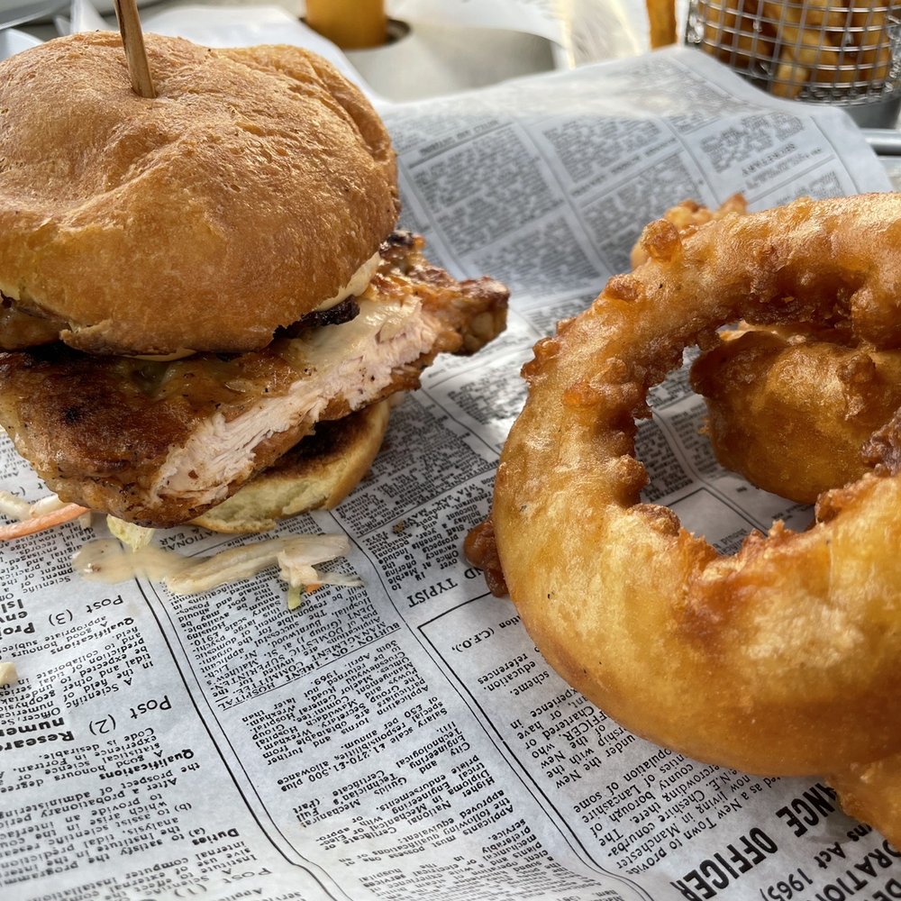 Mad Cow - Muddy Clucker, onion rings (upgraded) - Burgers Near Me - Eagan, Minnesota Mad Cow - Muddy Clucker, onion rings (upgraded) - Burgers Near Me - Eagan, Minnesota