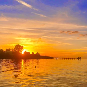 Bokeelia Fishing Pier - Sunset and a flying Mullet. - Fishing Near Me - Bokeelia, Florida