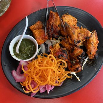 Indian Villa - a plate of food on a red table - Indian Near Me - Edmonton, Alberta