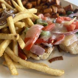 Poblano Chicken with side of fries and brown gravy and sweet potatoes
