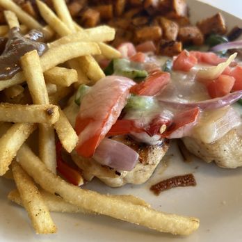 Luckys Cafe - Poblano Chicken with side of fries and brown gravy and sweet potatoes - American Near Me - Dallas, Texas