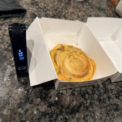 The NIMA Gluten scanner next to the Flying Dutchman whole grilled onion wrapped