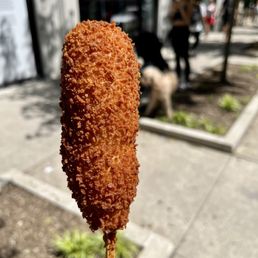 a hot dog on a stick a hot dog on a stick