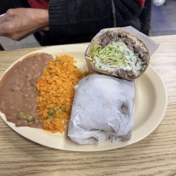 Taqueria Toluca - Frijoles and seasoned rice. Burrito - Mexican Near Me - Waukegan, Illinois Taqueria Toluca - Frijoles and seasoned rice. Burrito - Mexican Near Me - Waukegan, Illinois
