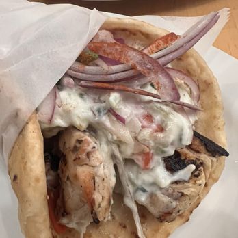 It's Greek To Me - Chicken souvlaki with slivered onions thin sliced tomato and taziki sauce in a pita. - Greek Near Me - Fort Lee, New Jersey