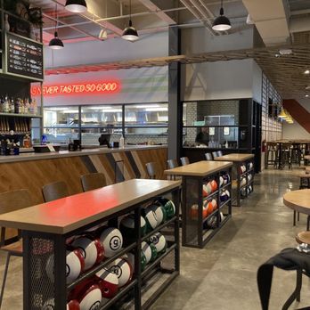 WhirlyBall - a restaurant with a bar and tables - Venues & Event Spaces Near Me - Brookfield, Wisconsin