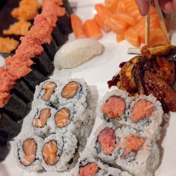 Sushi Palace - a plate of sushi and rolls - Sushi Bars Near Me - Edison, New Jersey