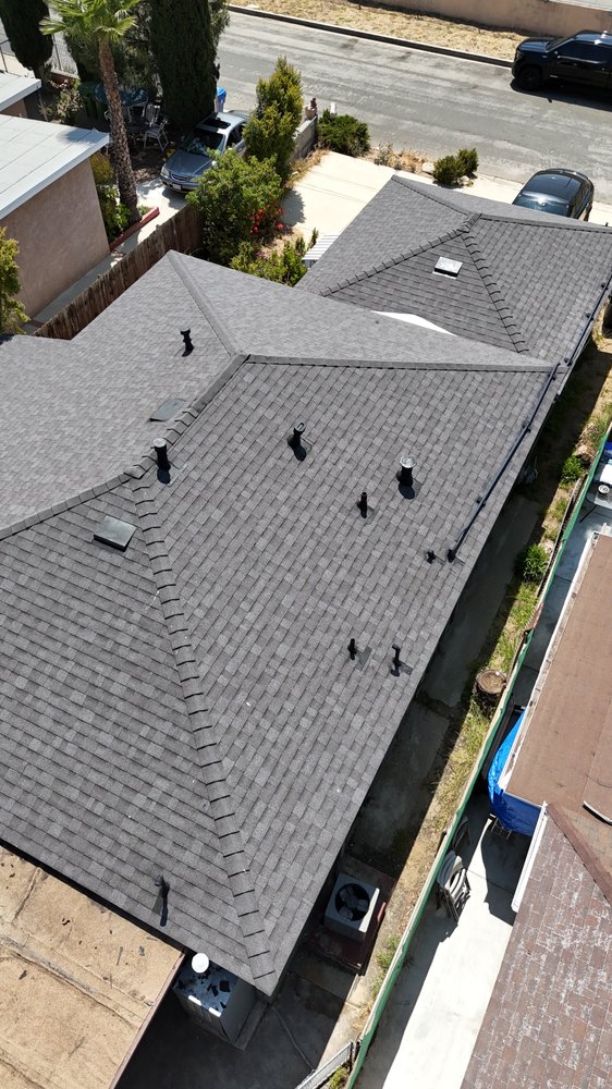 Slide of Precision Roofing
