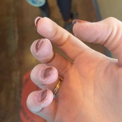 Kevin's Nails & Spa - Worst nail place I have ever been to. Wont ever be returning. Miss Louie Vuitton Lady was so rude. If you want shi*ty nails go to Kevins!