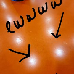 The counter where all the smoothies and food are brought out to the customer. The hair was stuck in old smoothie juice stuck to the counter.