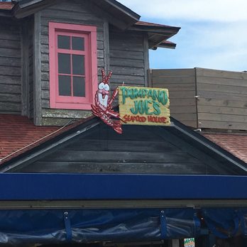 Pompano Joe's - Kind of small compared to the other sign - Seafood Near Me - Destin, Florida