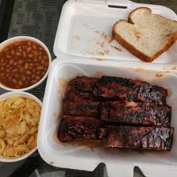 We Smokin -  a tray of ribs, beans, and bread - Food Trucks Near Me - Cincinnati, Ohio