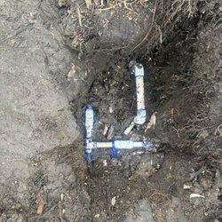 Moore Sprinkler Company - Detail of mainline repairs under pecan tree