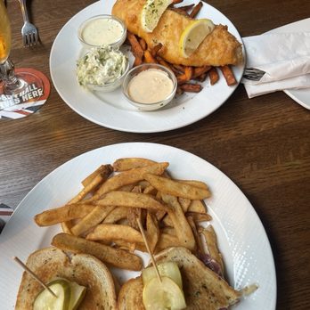 Elephant & Castle - Fish and sweet potatoes, also known as chips. Ruben sandwich with french fries, also known as chips. - Pubs Near Me - Chicago, Illinois