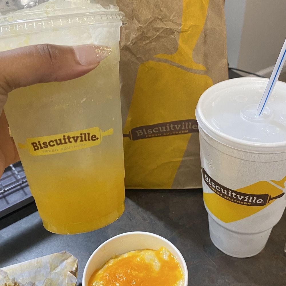 Smoked sausage biscuit with peppers and onions, cheese grits, Starr soda, and the pineapple cream soda