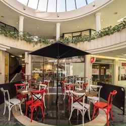 Get Caffeinated - Fantastic outdoor dining area,free wi-fi,being sole operated he does a great job.home made treats and daily specials.