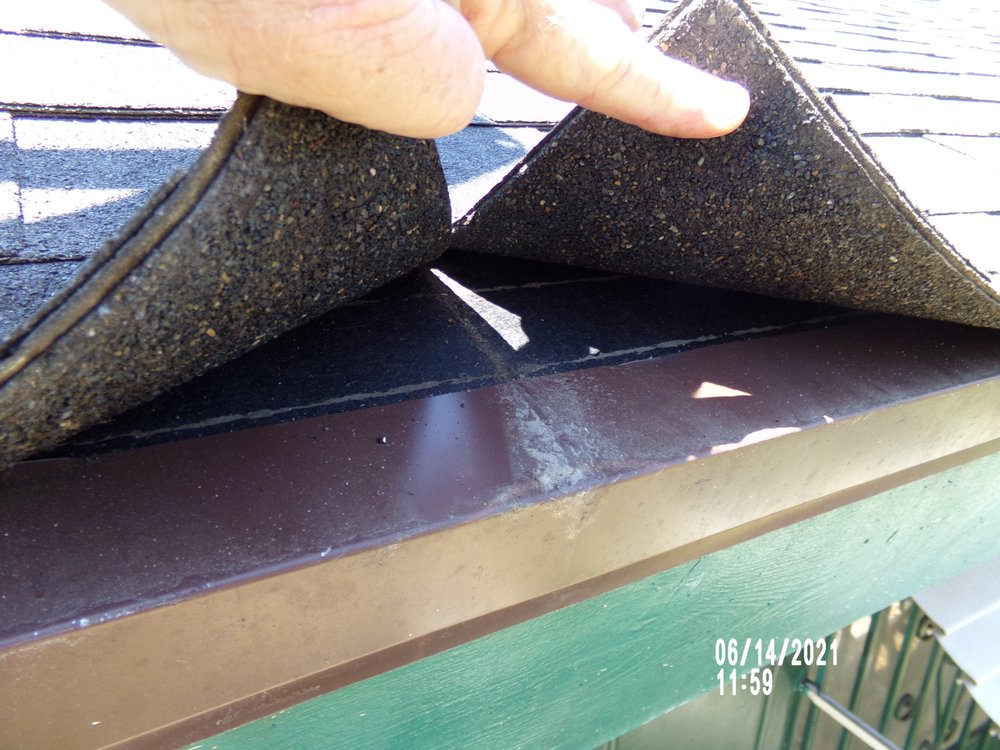 Slide of Tom Byer Roofing Service