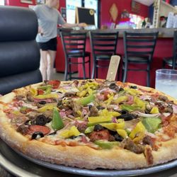 The Pizza Box - The Box Deluxe with banana peppers added. Yum